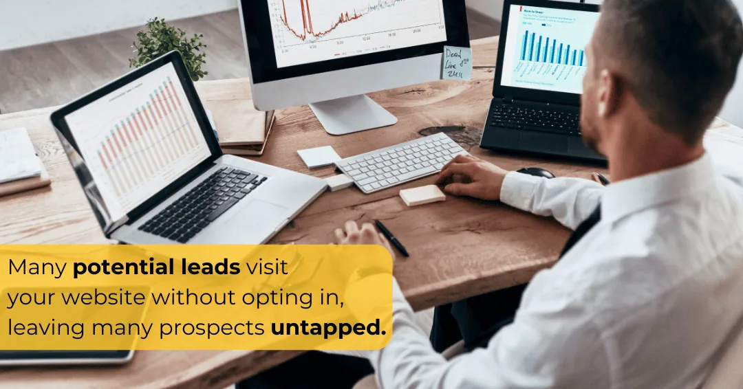 Many potential leads visit your website without opting in, leaving many prospects untapped, over a man at analytics screens